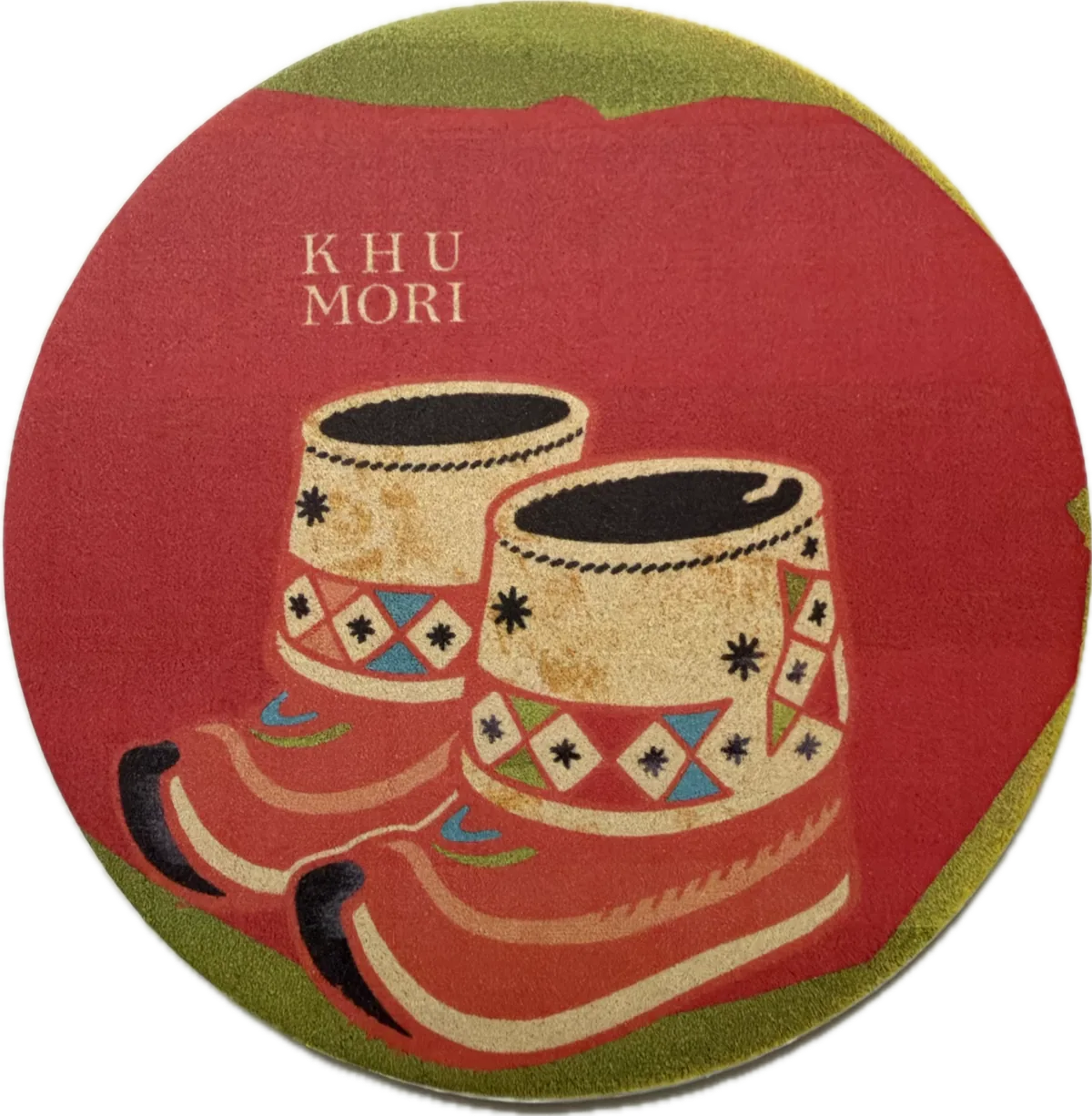 Full-colour Khumori artwork printed on a round handmade paper coaster